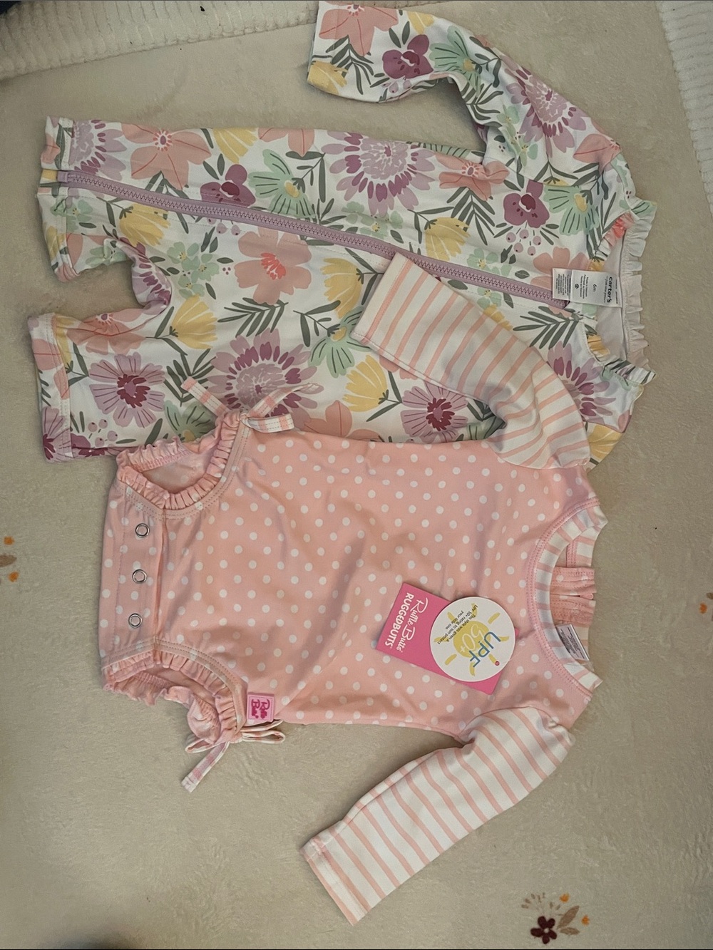 Baby bathing suits. One NWT